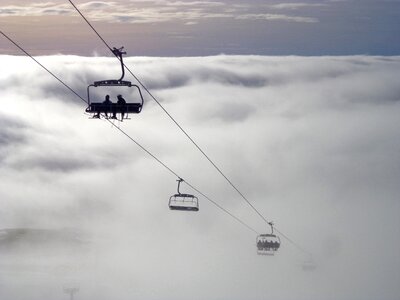 Chairlift sunset clouds photo