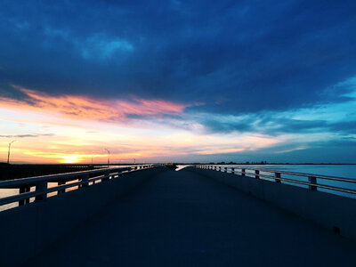 Sunset over the Bridge and Bay in Tampa, Florida photo