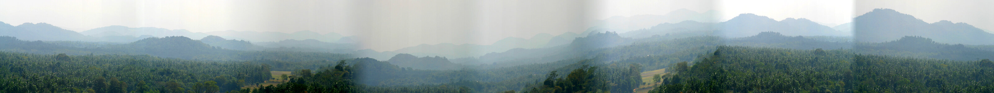 Dambadeniya Mountain top with misty landscape photo