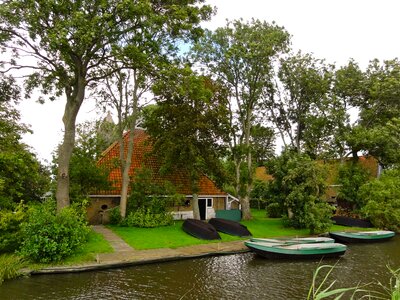 Boats architecture trees photo