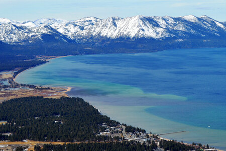 Snow-capped Mountains landscape and the bay of Lake Tahoe photo