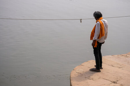 Old Man Standing on Edge