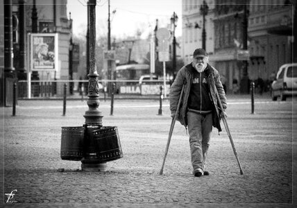 Person crutches poor photo