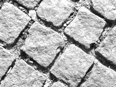 Cobbled pavement cobble stone pavement tiled road photo