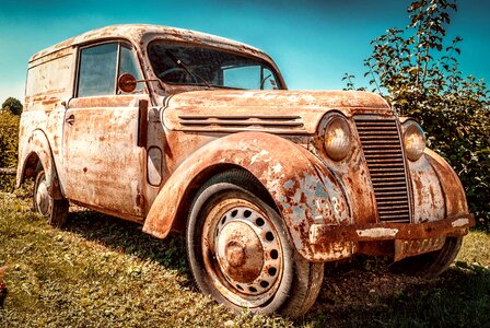 Abandoned antique automobile photo
