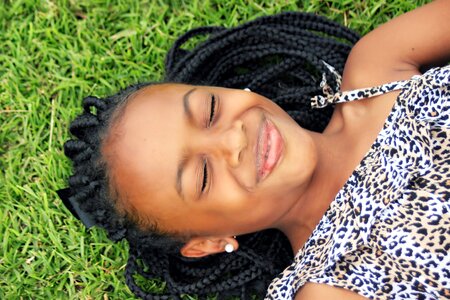 Laying down outdoors happy