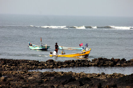 Fisherman Boat Sea Waves photo