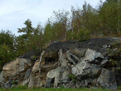 Blackened rocks in Sudbury in Ontario, Canada