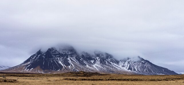 Clouds above the Mountains in Iceland photo