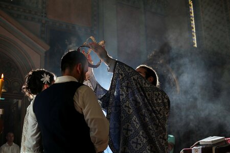 Baptism coronation priest photo