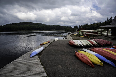 Canoes by the lakeshore at Algonquin Provincial Park, Ontario photo