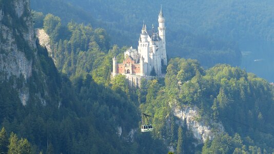 Neuschwanstein castle mountains fairy castle photo