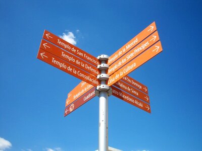 Guidepost directional signboard photo