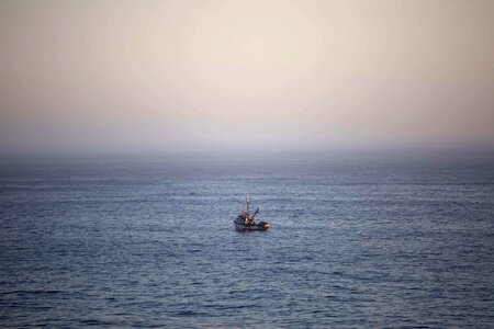 Boat fishing gray photo