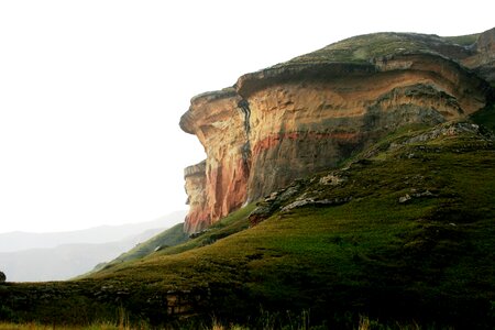 Cliff green slopes soft light photo