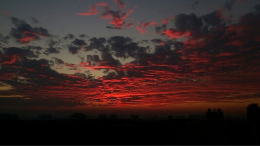 Fiery orange sunset sky photo