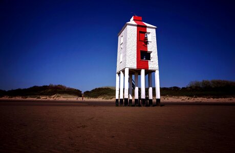 Beach dusk lighthouse
