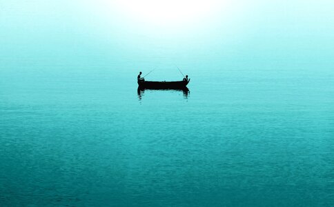 Boat dusk fishing photo