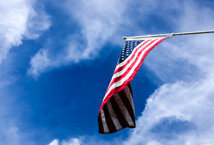 Flag of the United States on the Blue Sky photo