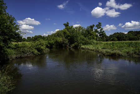 Landscape of he Sugar River under blue skies