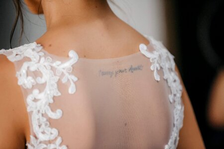 Back tattoo bride photo