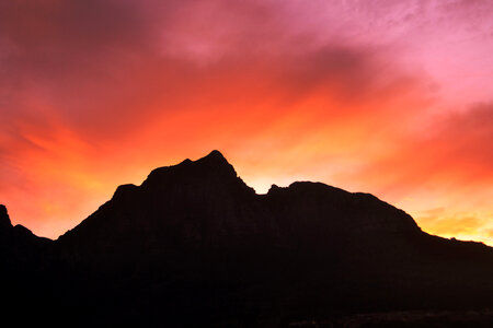 Dusk and sky behind the mountains in Cape Town, South Africa photo
