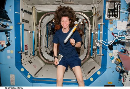 Woman no gravity iss photo