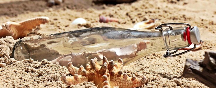 Beach bottle coast photo