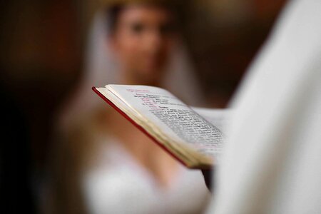 Priest book wedding photo