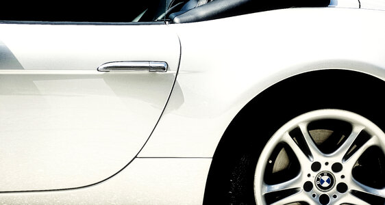 Closeup of White Cabrio BMW Car photo