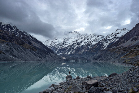 Hooker Lake landscape with clouds and fog with mountains in New Zealand