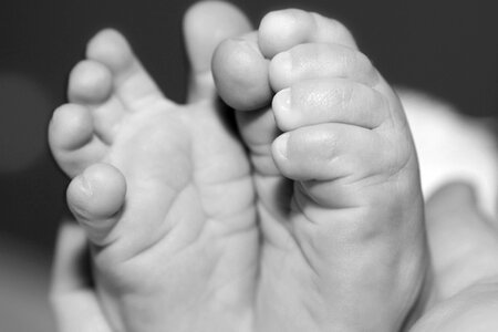 Arm baby barefoot photo