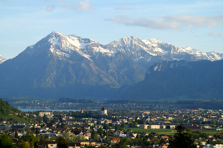 High Mountains Behind the City in Steffisburg, Switzerland photo