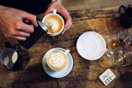 Barista preparing coffee cappuccino