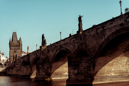 The historic 14th century Charles Bridge in Prague over the river Vlatava
