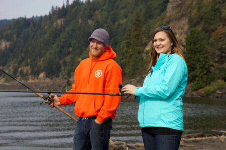 Young couple fishing for Fall Salmon-2