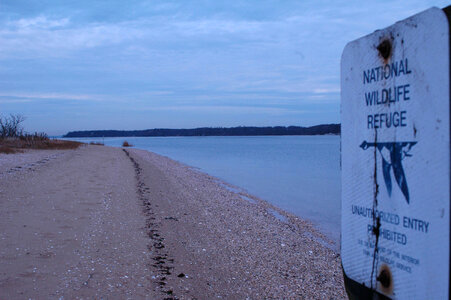 Refuge sign at Oyster Bay National Wildlife Refuge shore