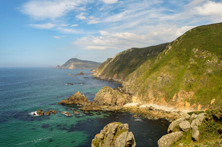 Mountainous coastline landscape and ocean photo