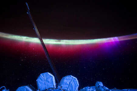 Auroras Colorful Veil Over Earth photo