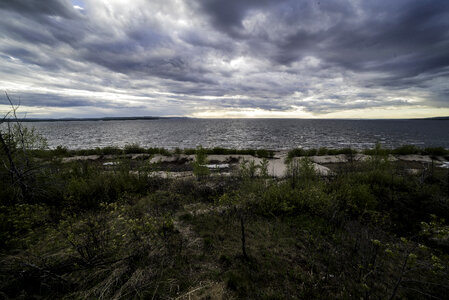 Scenic landscape under the clouds at Lesser Slave Lake photo