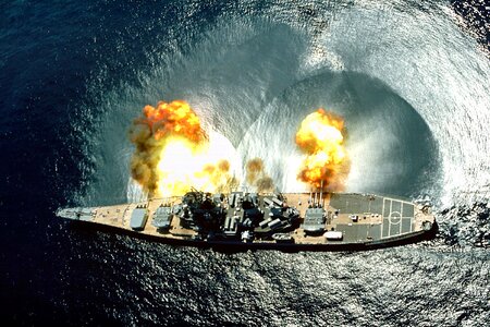 USS Iowa (BB-61) fires a full broadside photo