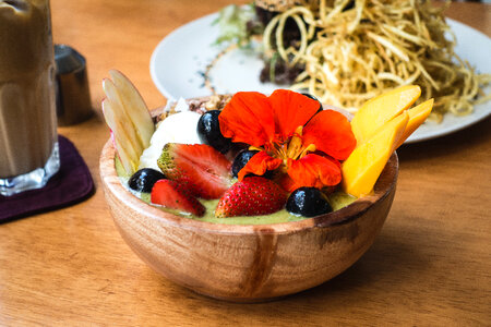 Colorful healthy smoothie bowl with fruits photo