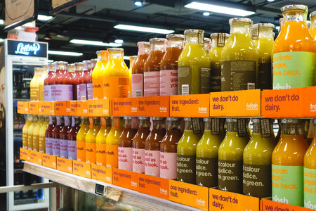 Fruit juices in supermarket photo