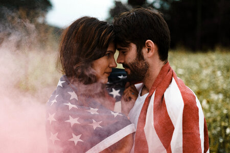 Couple Wrapped in a US Flag photo
