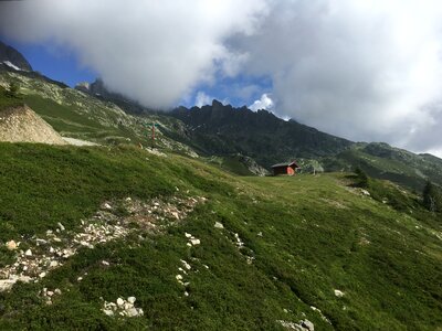 Mountain trail looking towards Mont Blanc mountain range photo