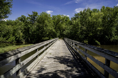 Bridge across the river on bike path on Sugar River State Trail