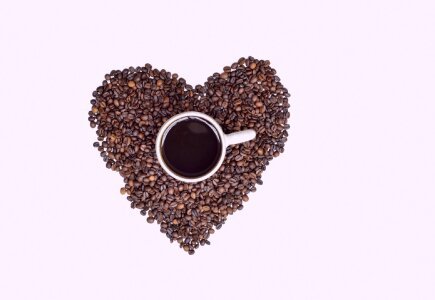 Beans love cup of coffee photo
