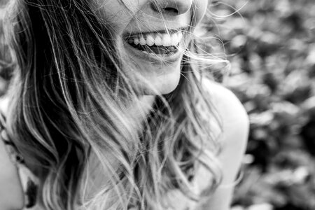 Outdoor Portrait of a Beautiful Happy Smiling Young Woman photo