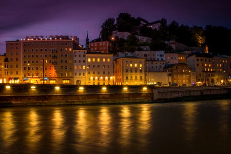 Night Time with lights on the river in Salzburg, Austria photo