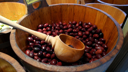 Wooden Spoon scooping out red beans photo